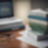 Books stacked on a desk with financial graphs